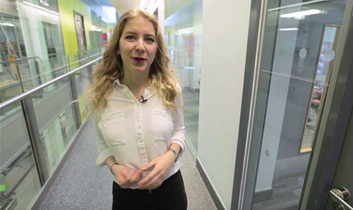 A female student giving a virtual tour of the University's chemical engineering facilities