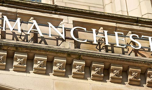 Close-up of Manchester sign on the exterior of Whitworth Hall