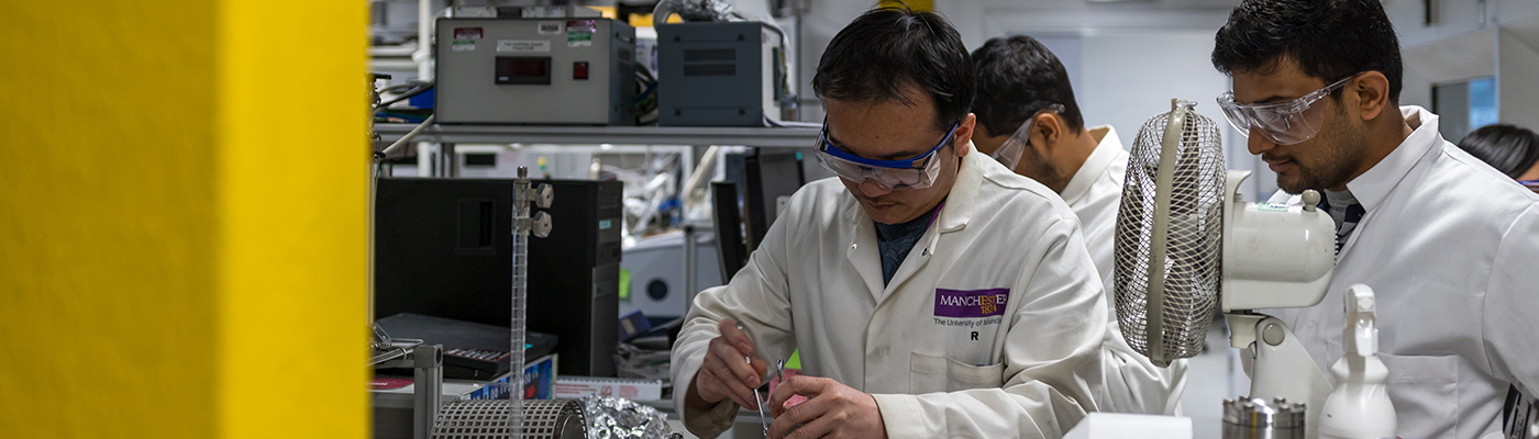 Scientists in a lab conducting an experiment