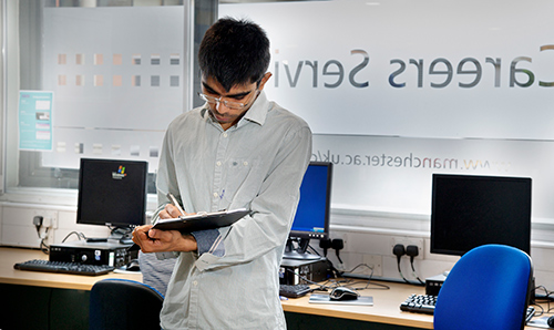 A male worker in the Careers Service