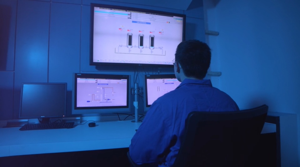 Student looking at computer screens 